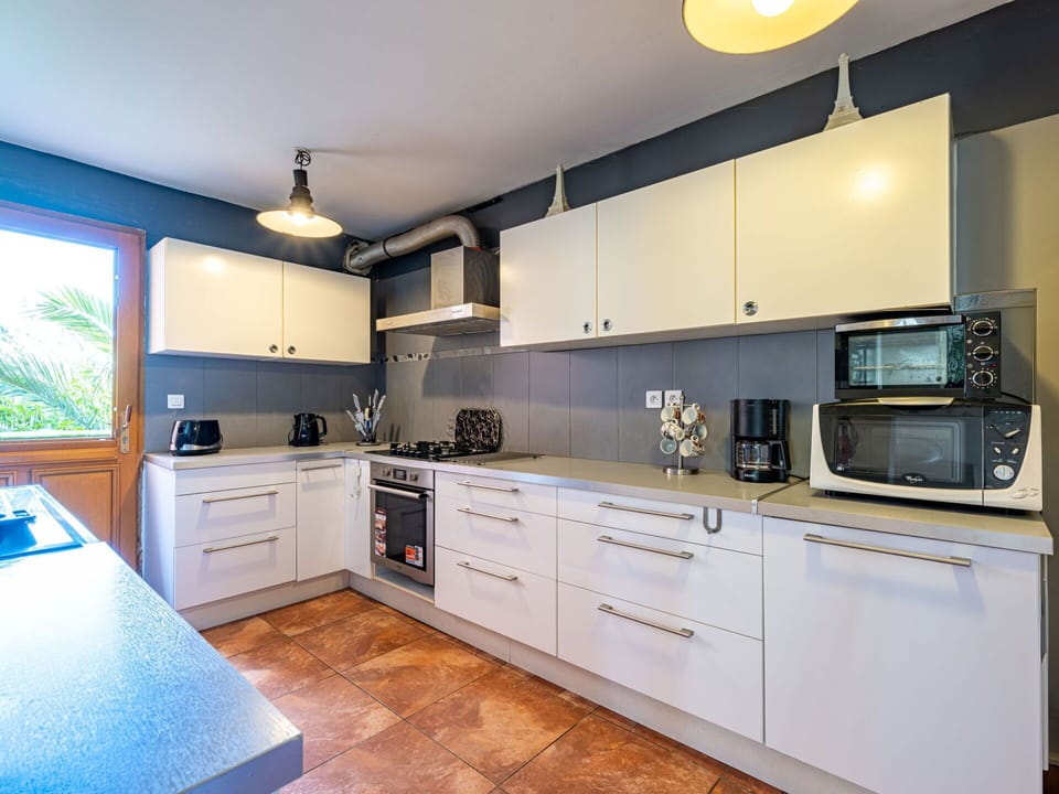 Countertop, Cabinetry, Furniture, Kitchen Stove, Drawer, Tap, Blue, Kitchen Appliance, Building, Kitchen