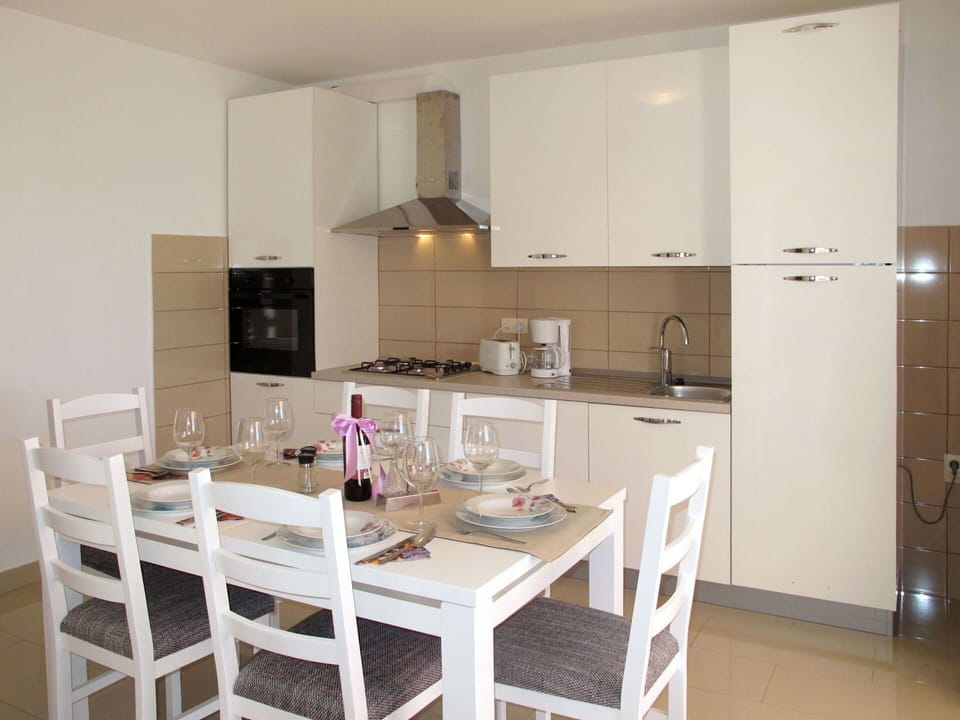 Cabinetry, Furniture, Countertop, Table, Chair, Tableware, Wood, Kitchen, Home Appliance, Interior Design