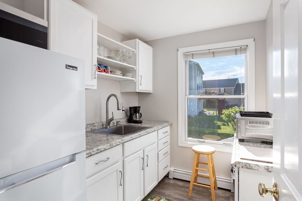 1 st floor kitchenette with microwave, coffee maker, toaster oven and frig