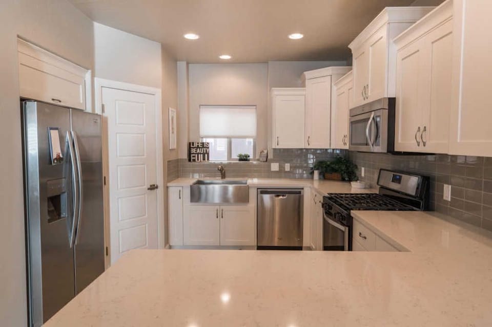 Kitchen view with pantry to left