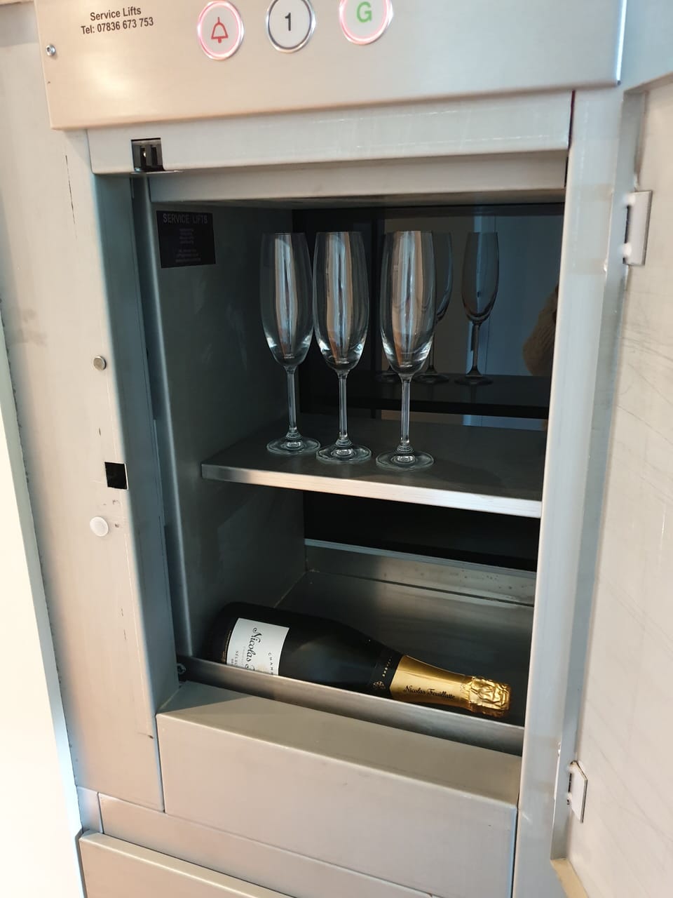 Dumbwaiter - fill with glasses and bottles and send to the roof terrace!
