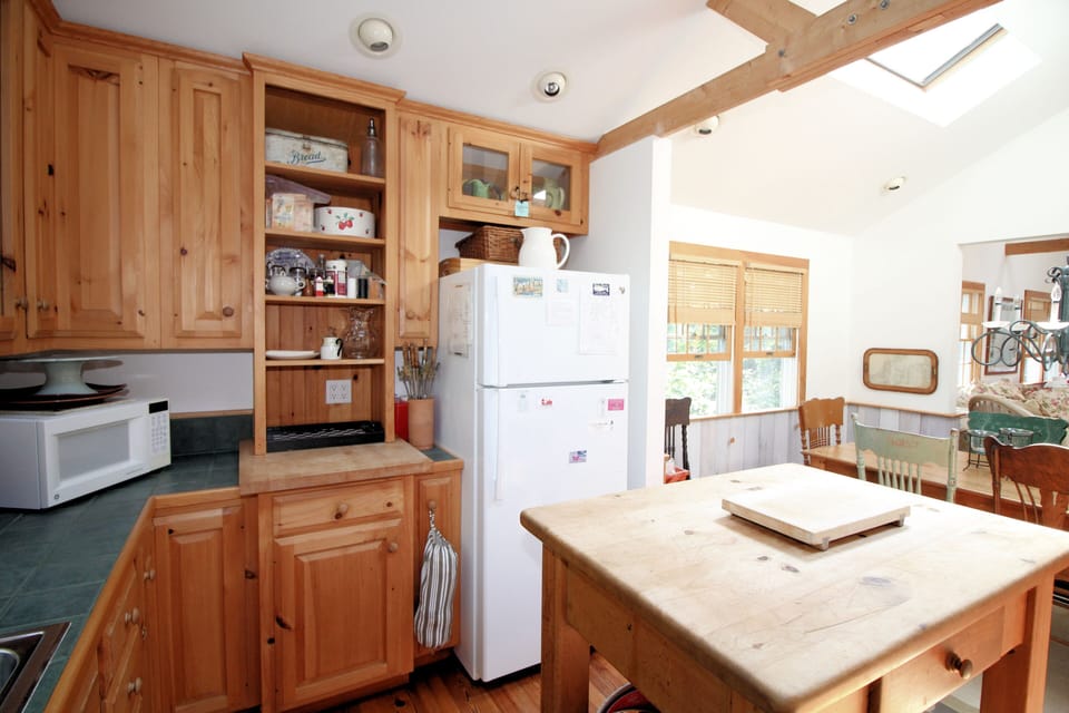 Kitchen opens to dining room