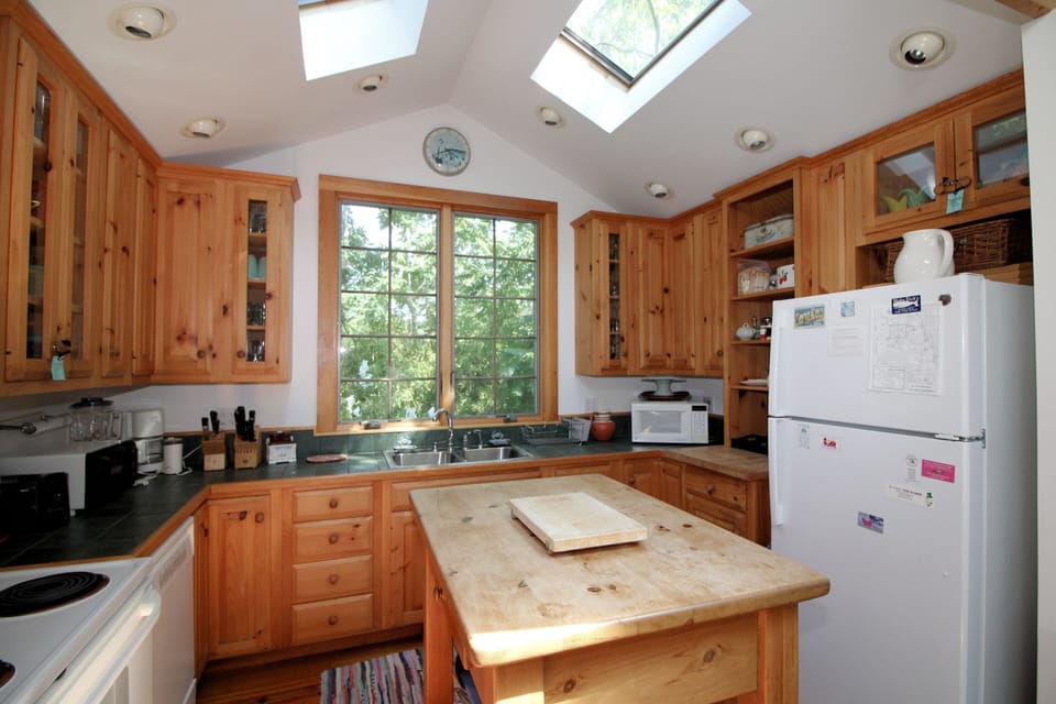 Kitchen has an island for extra work space