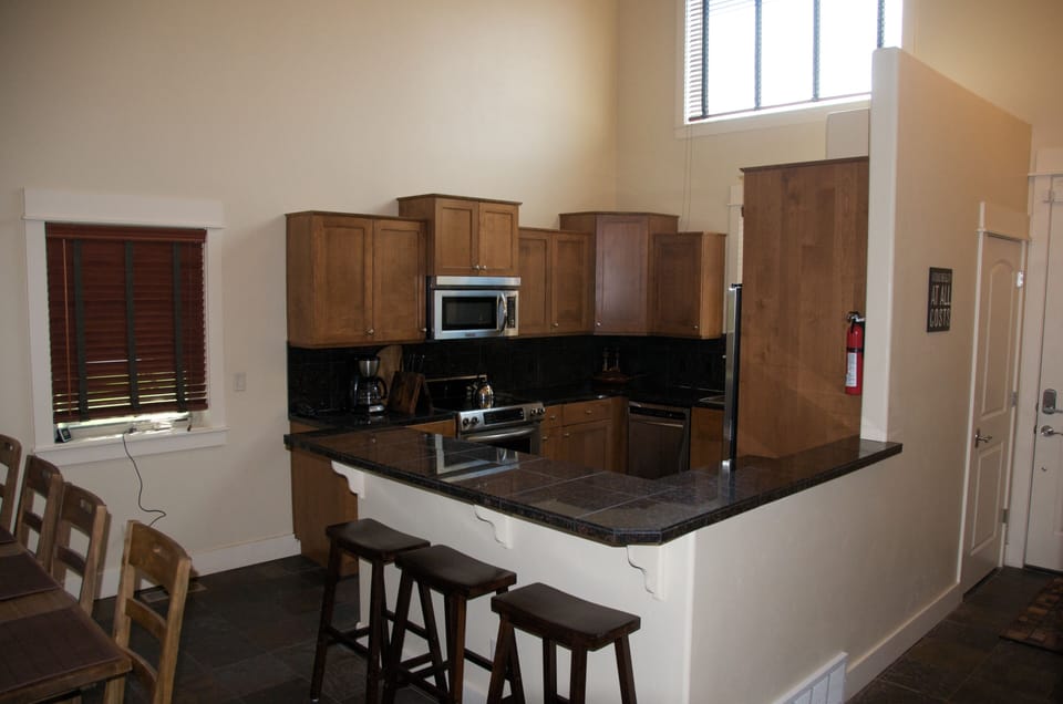 The breakfast bar and kitchen