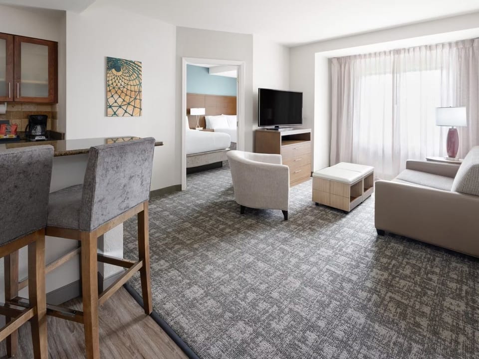 Gather in the spacious living area with a flat-screen TV and plush seating — wind down after a day at Hersheypark