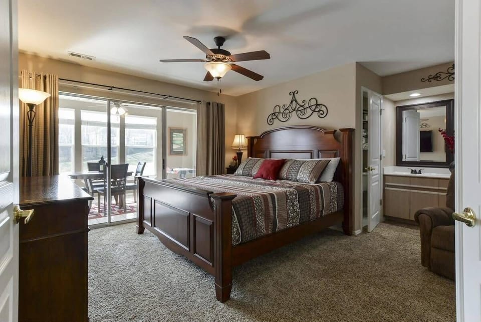 Primary King bedroom - with walkout access to enclosed porch