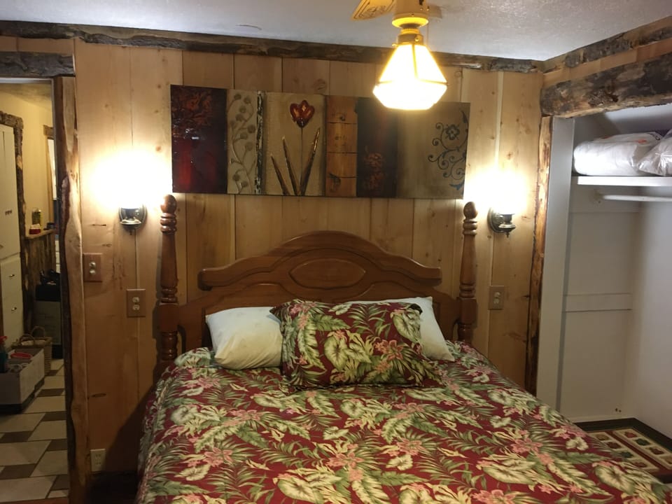 The main bedroom.  Enter the other bedroom and birdhouse from here.