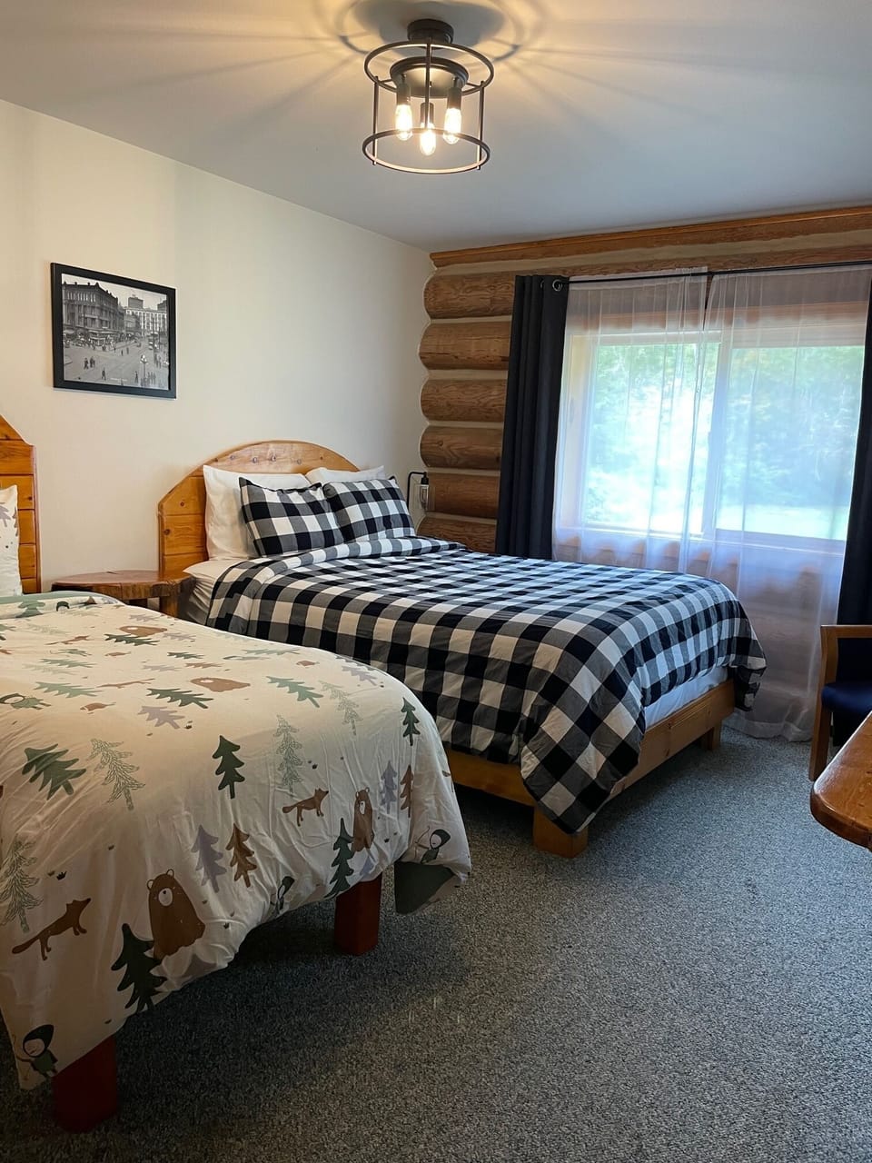 Bedroom #1 enjoys mountain views with both a queen and twin bed. 