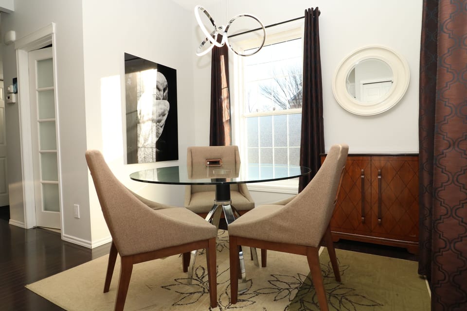 Dining room adjacent to the kitchen, additional chairs available