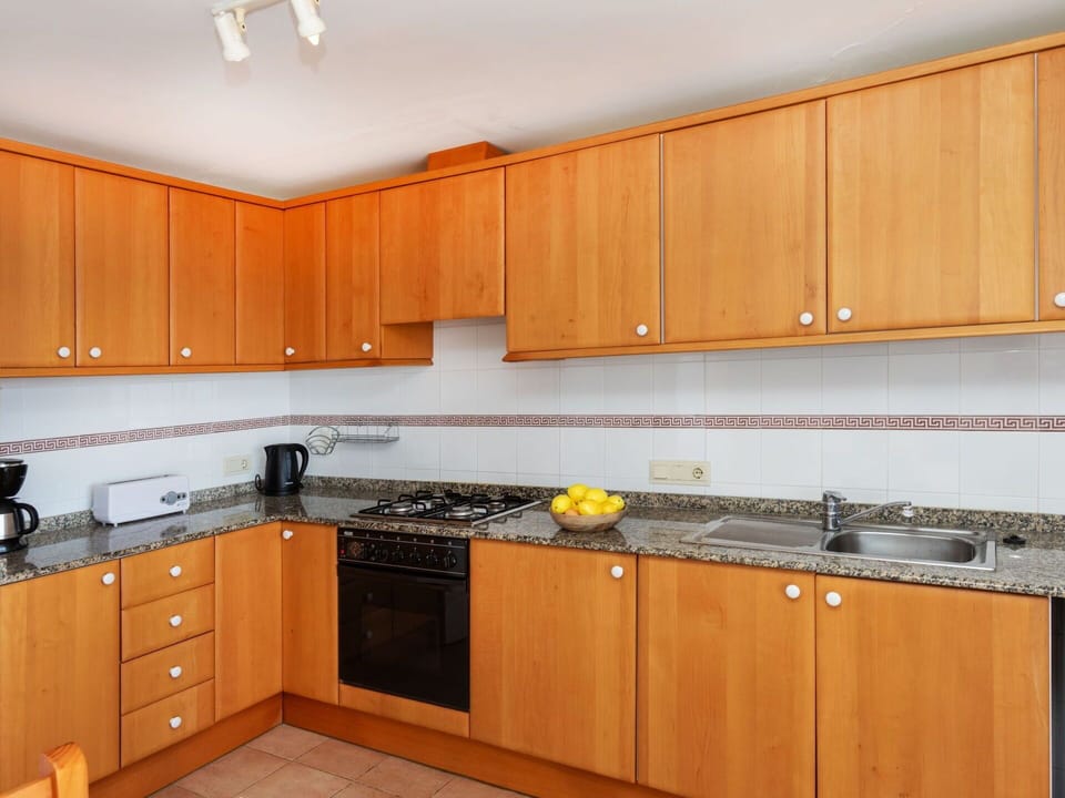 Cabinetry, Countertop, Property, Kitchen Sink, Sink, Kitchen, Wood, Kitchen Appliance, Interior Design, Kitchen Stove