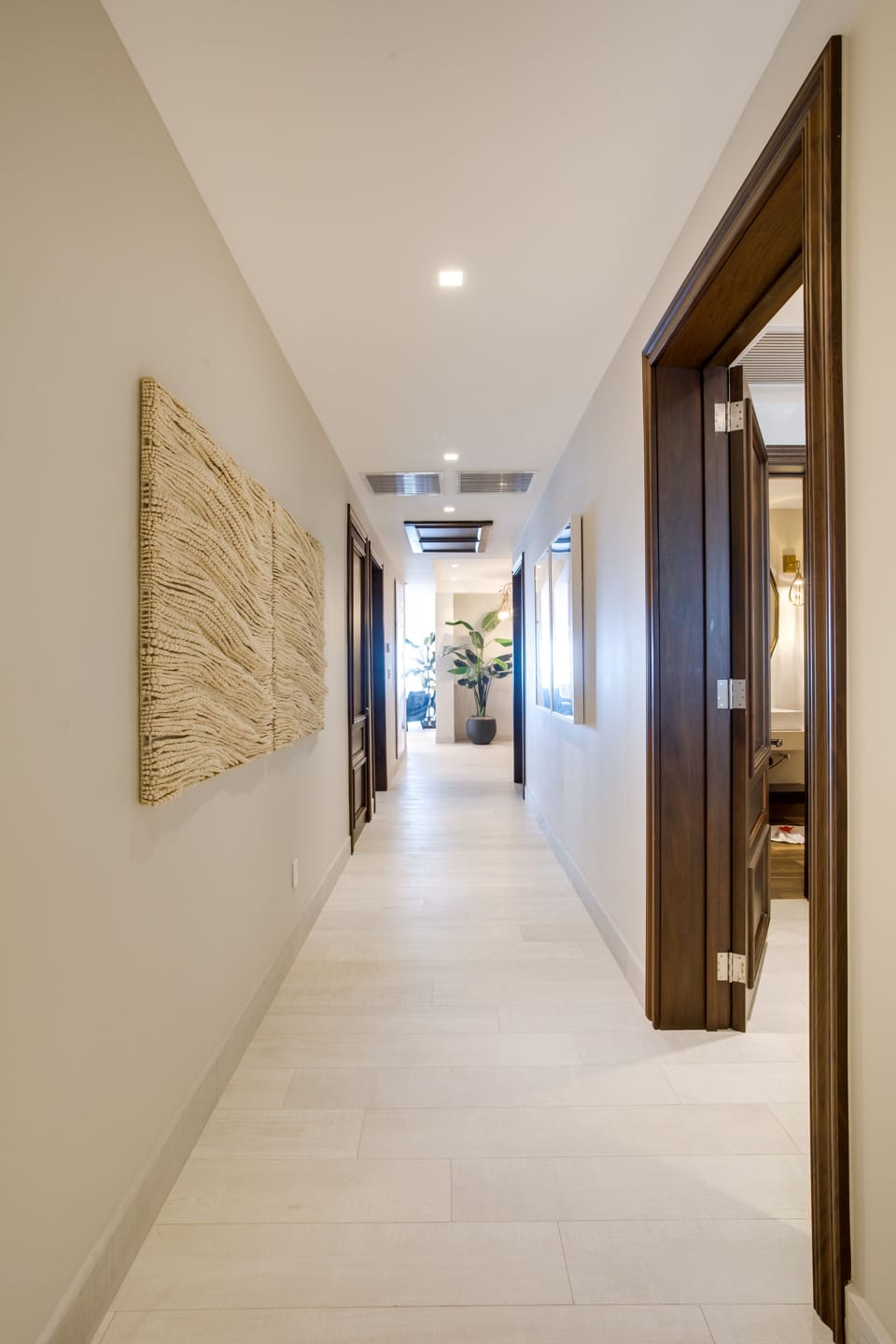 Hallway to bedrooms and back patio