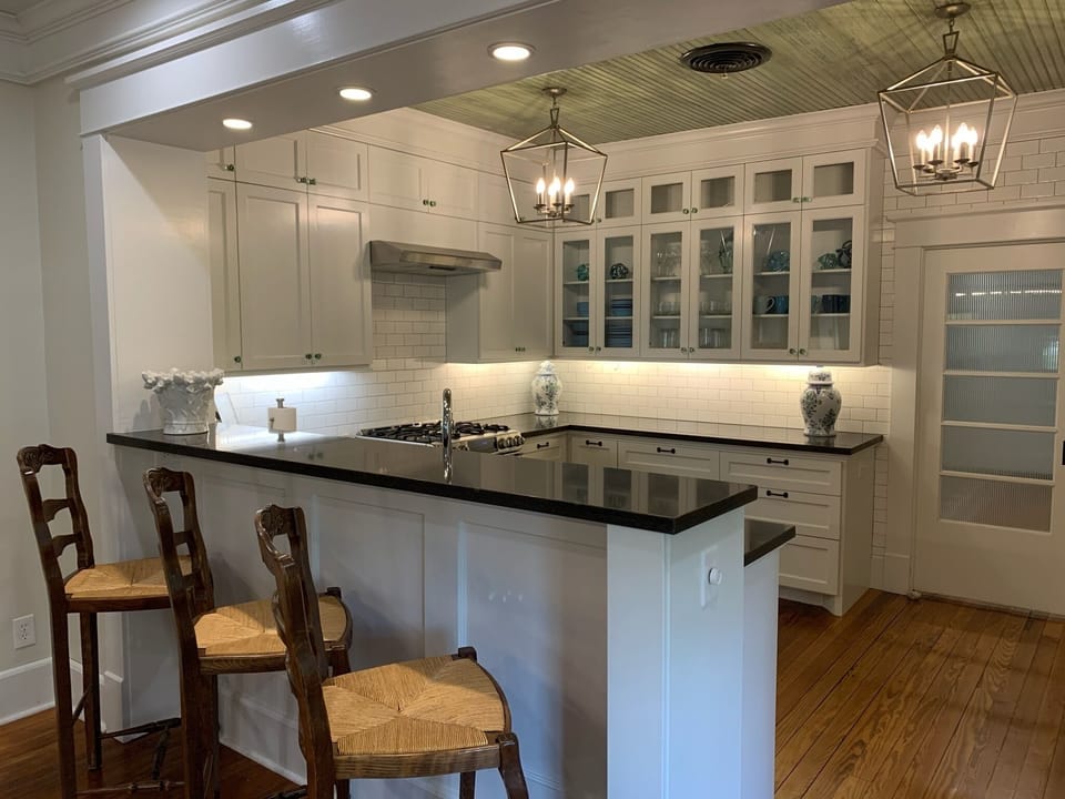 Kitchen with ceiling made from siding of house in 1899