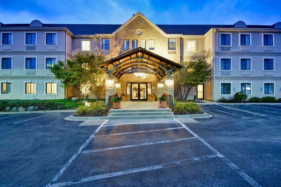 Covered entrance with branded awning welcomes guests to the property