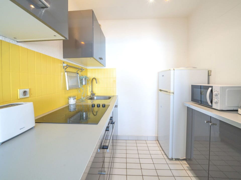 Kitchen, Flooring, Countertop, Floor, Major Appliance, Interior Design, Kitchen Appliance, Kitchen Sink, Plumbing Fixture, Sink