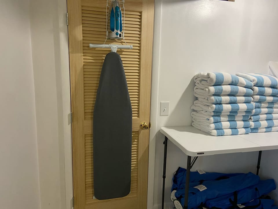 Iron and board. Beach towels and chairs for up to 12 people 