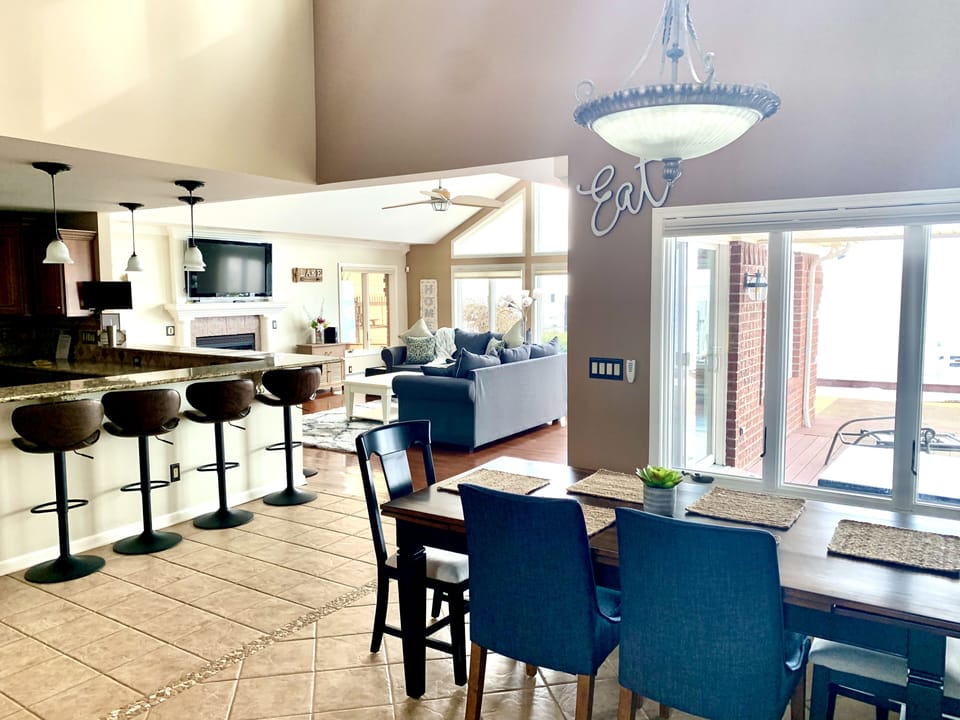Dining area with beautiful high ceilings 