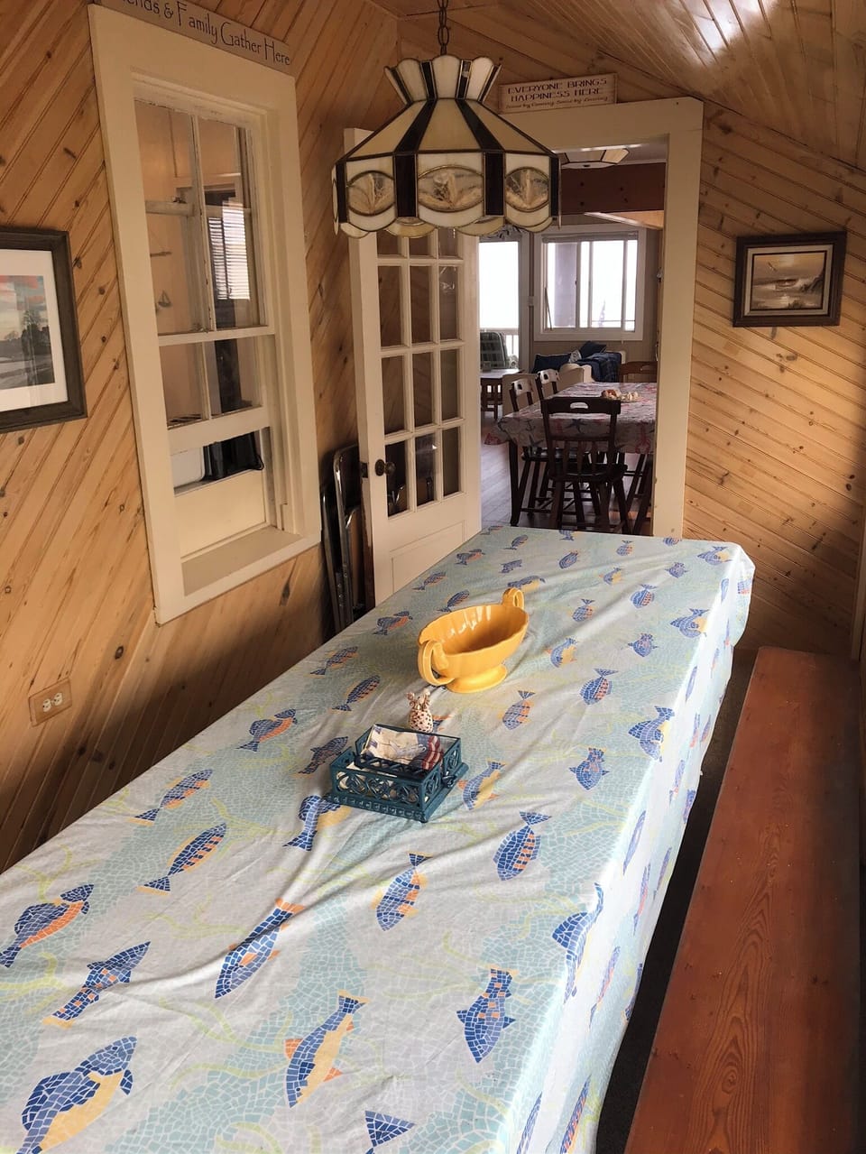 Dining porch with large picnic table - perfect for family meals