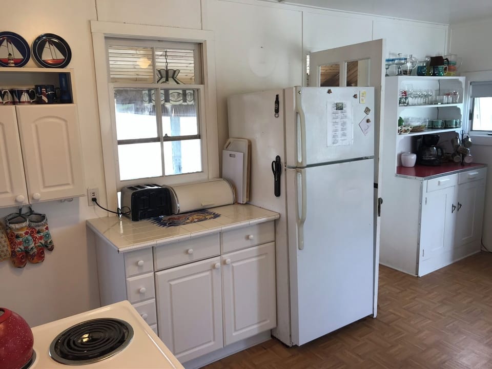 Kitchen includes microwave and drip coffee maker (with plenty of filters)