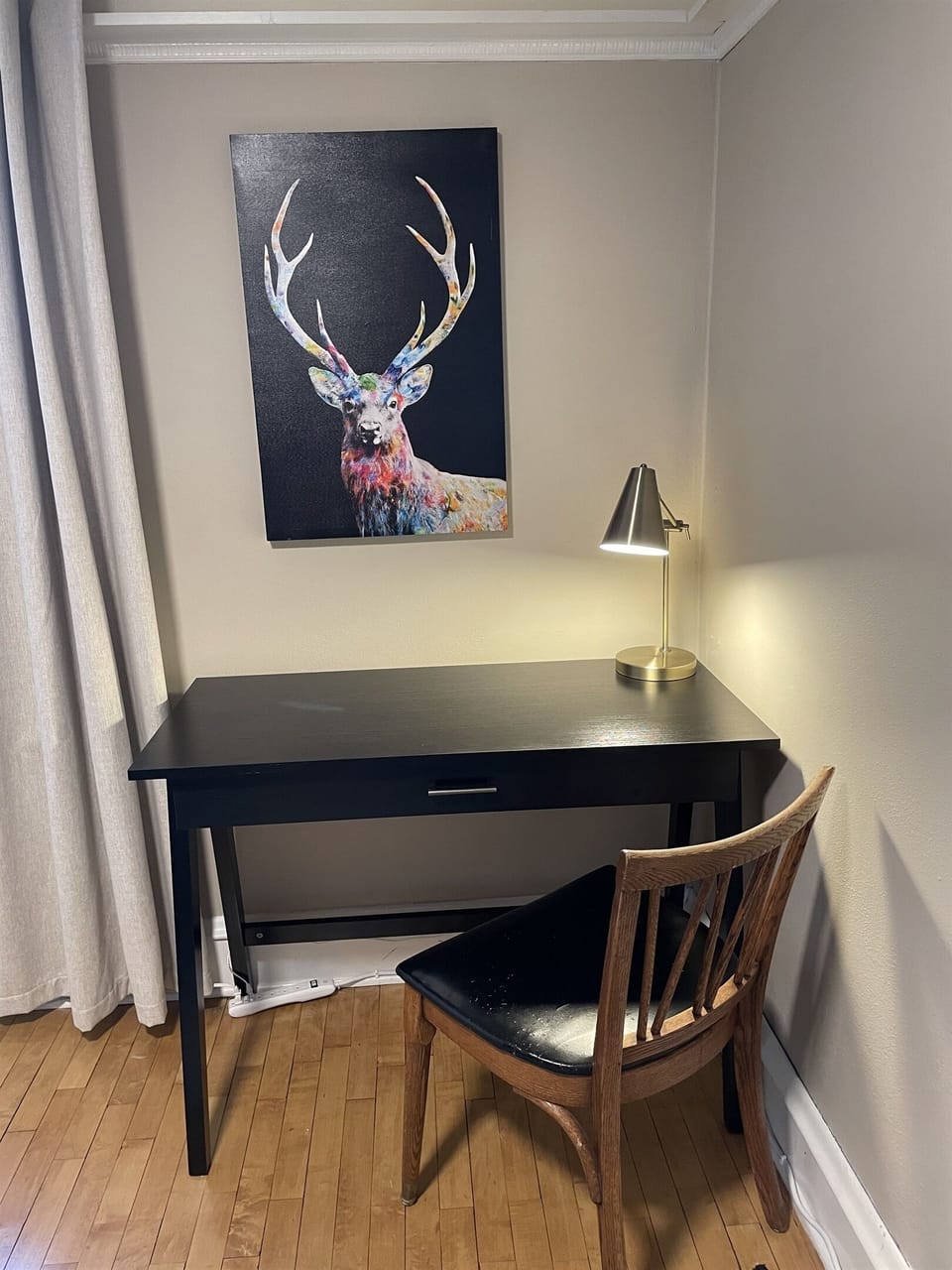 A comfortable work space is provided in the twin bedroom.