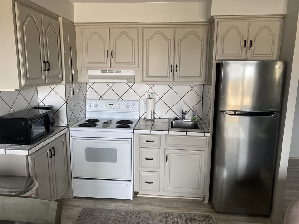 Condo overlooks the Crystal River and Lake Michigan.  Just steps to the beach.