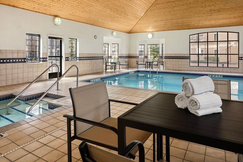 Unwind in the tranquil indoor atmosphere, complete with plush towels and a relaxing pool.
