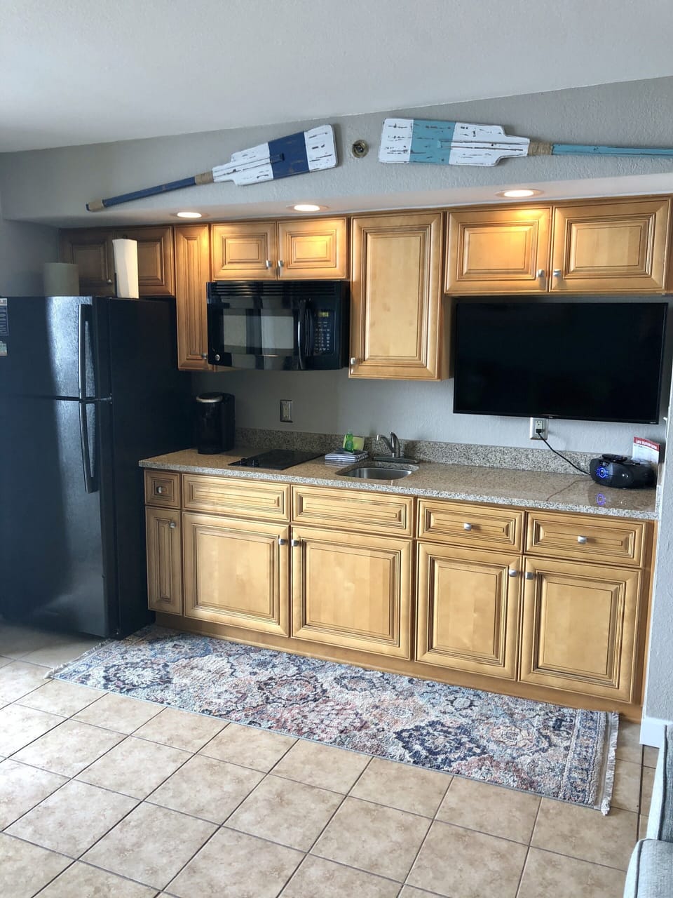 Full size fridge, electric cook top, Roku TV