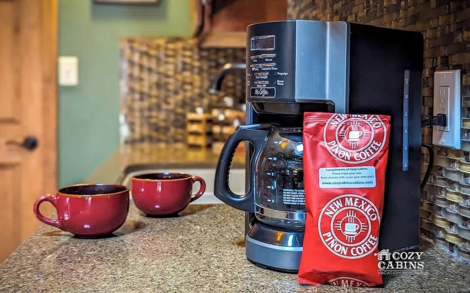 Experience the flavors of New Mexico with a pot of local Pinon Coffee, courtesy of Cozy Cabins.