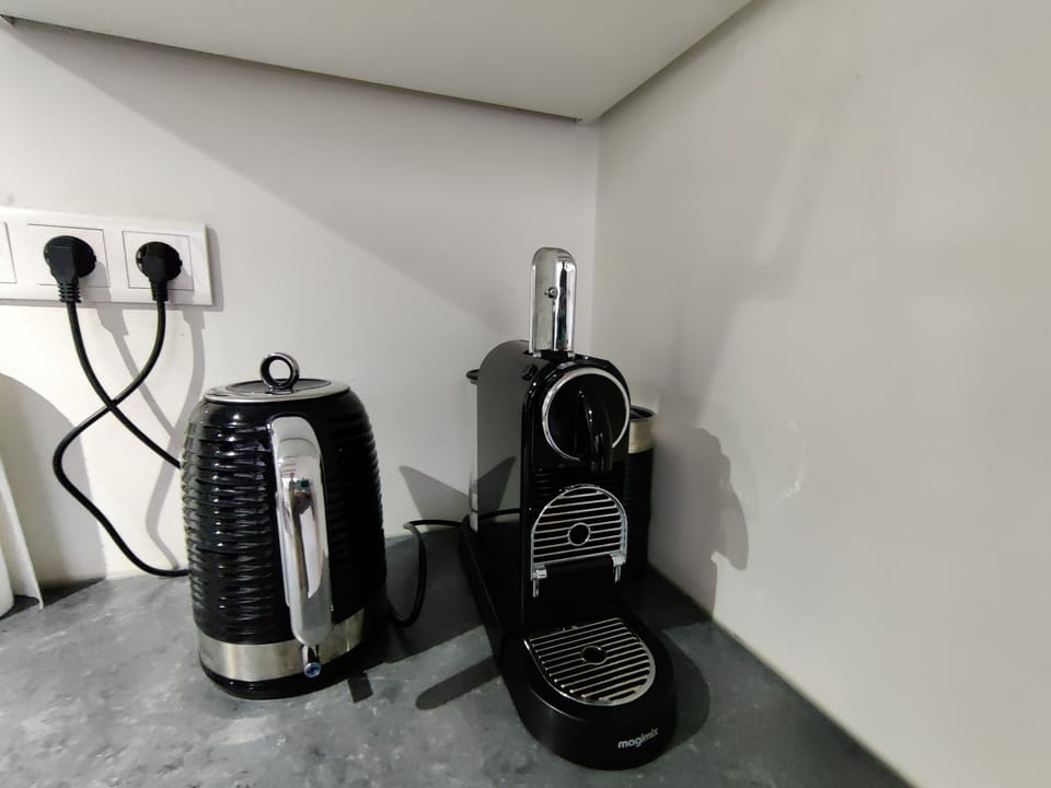 Water cooker and nespresso coffee machine and milk frotter