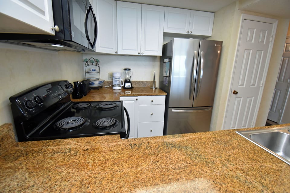 Dishes, cookware, coffee maker, & blender provided.