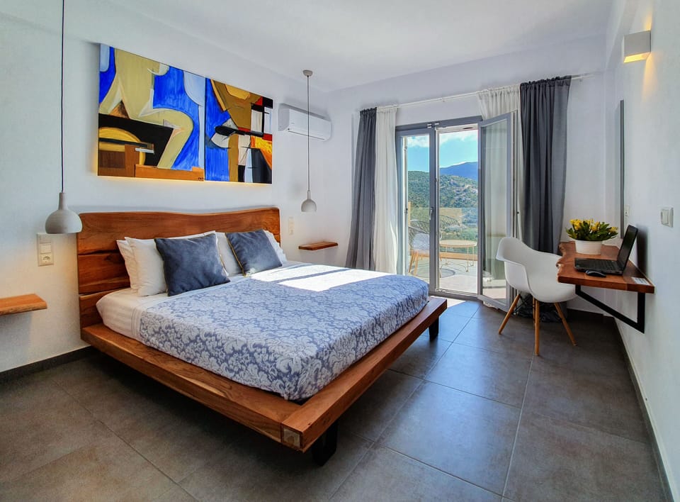Spacious bedroom with luxurious furniture and works of art