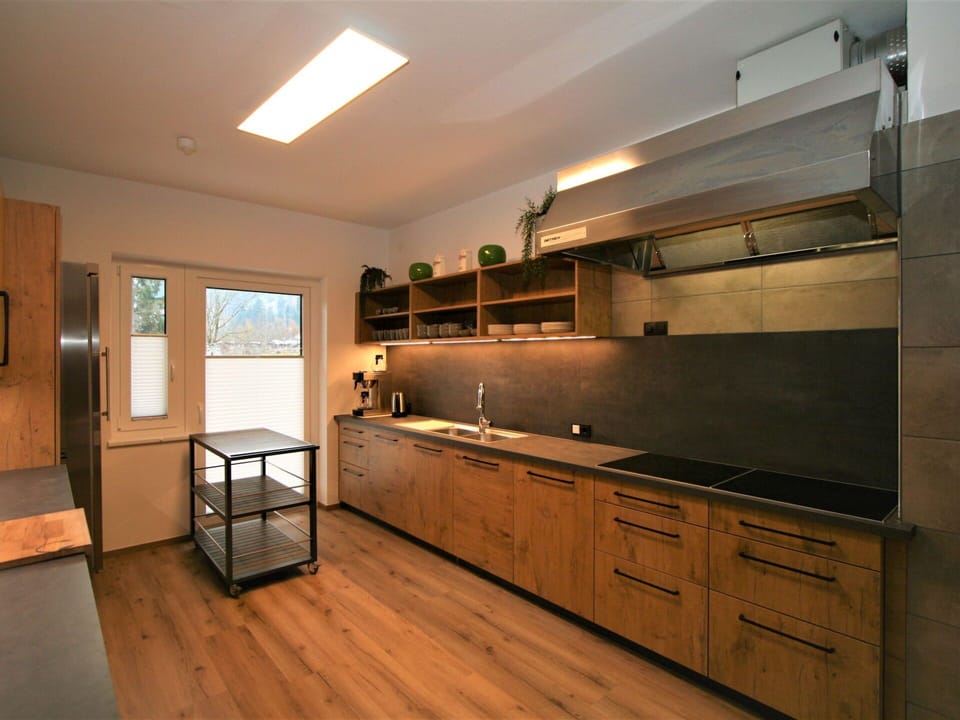 Cabinetry, Countertop, Building, Wood, House, Kitchen Stove, Flooring, Wood Stain, Floor, Kitchen