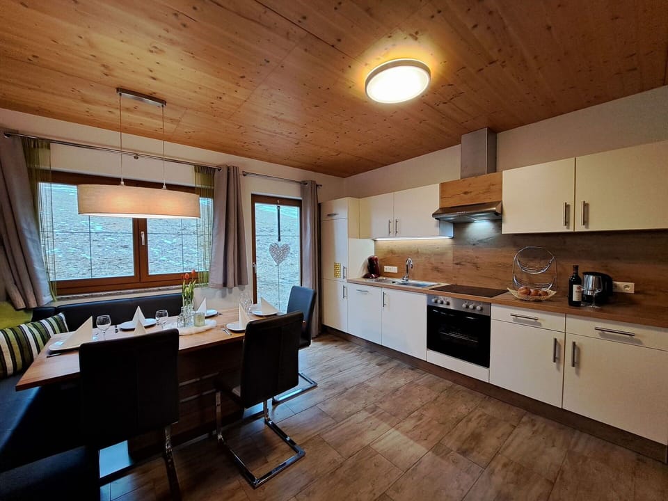 Cabinetry, Countertop, Furniture, Window, Kitchen Appliance, Kitchen, Wood, Kitchen Stove, Interior Design, Flooring