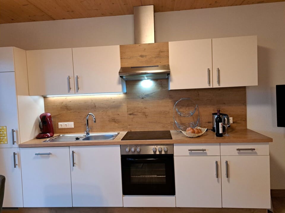 Brown, Cabinetry, Kitchen Sink, Countertop, Property, Sink, Building, Tap, Kitchen Stove, Kitchen Appliance