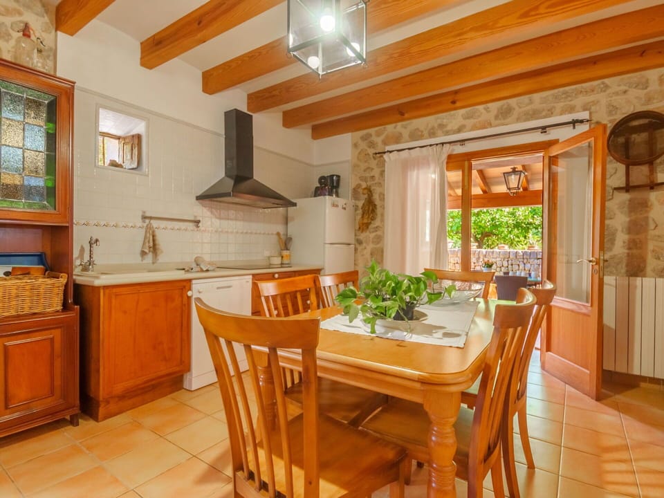 Countertop, Cabinetry, Furniture, Table, Chair, Kitchen, Wood, Kitchen Appliance, Lighting, Interior Design