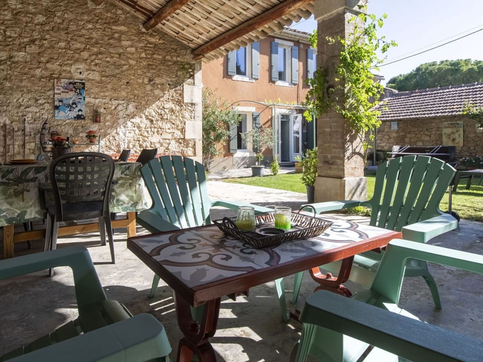 Building, Plant, Furniture, Table, Window, Outdoor Table, Outdoor Furniture, Shade, Interior Design, Flowerpot