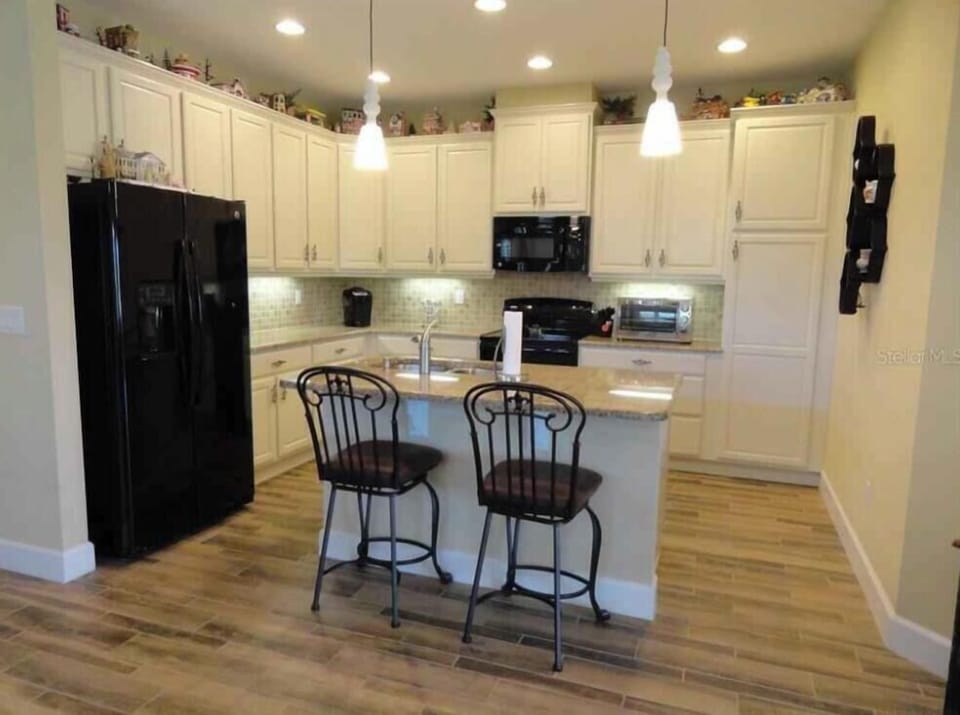 Kitchen with counter seating.