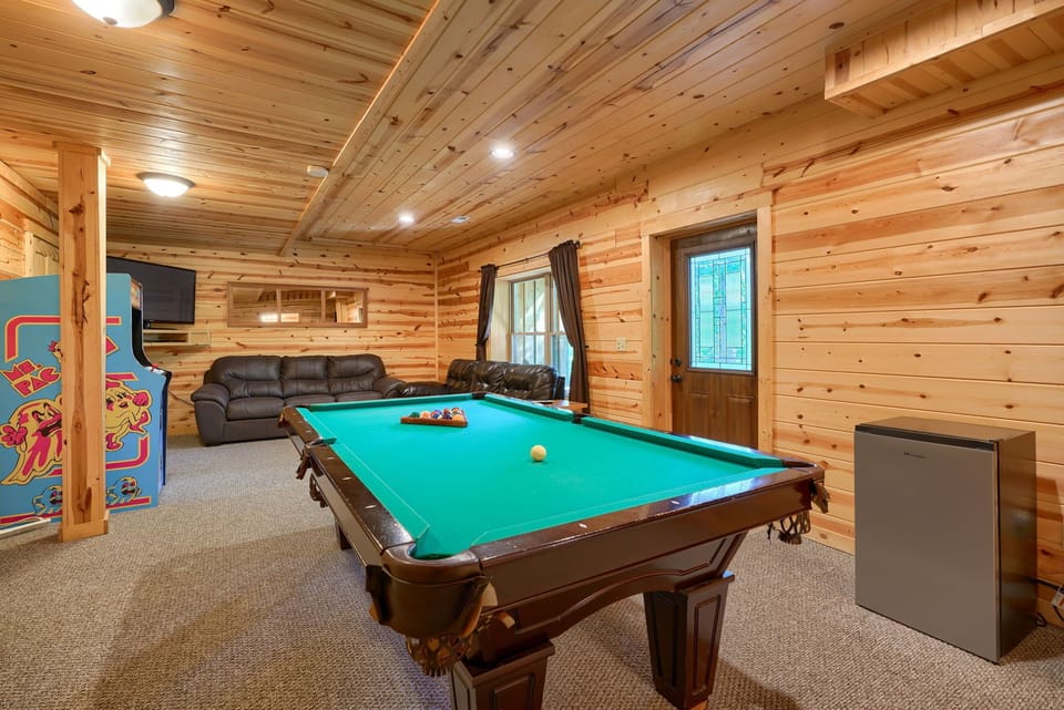 rec room with arcade game and pool table