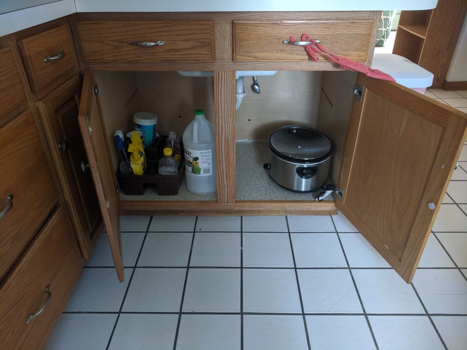 Crockpot and cleaning supplies