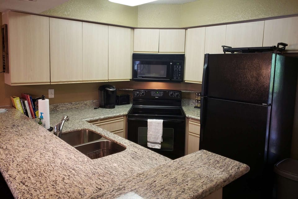 Fully Equipped Kitchen, with Granite Counter-Tops.