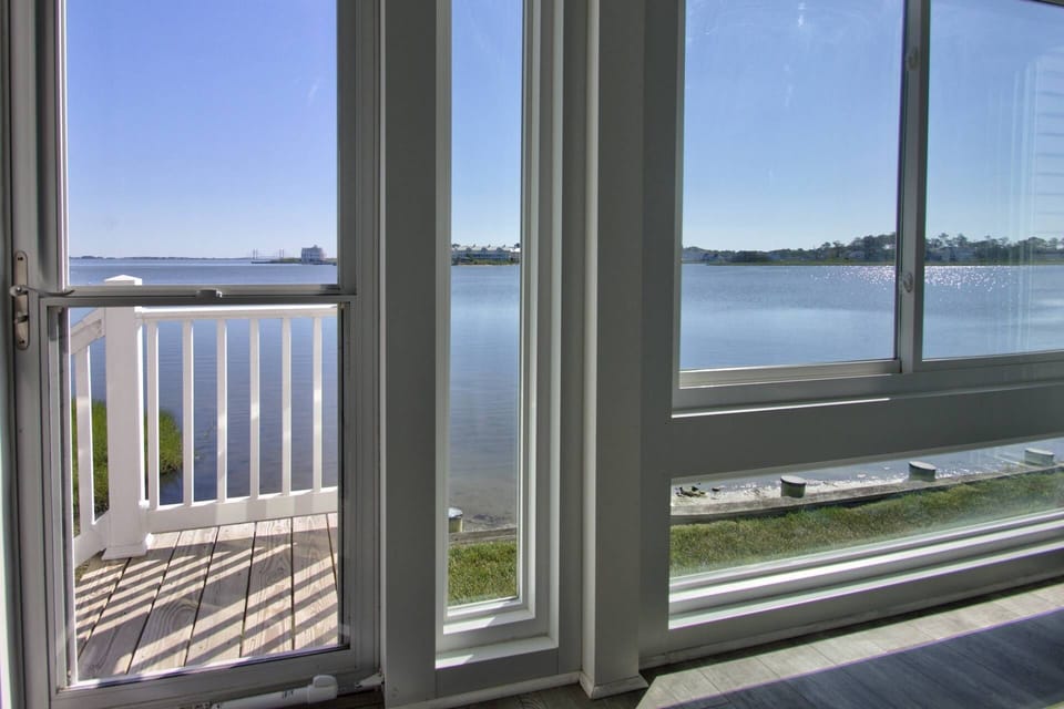 Water lapping at the shore in front of your condo.