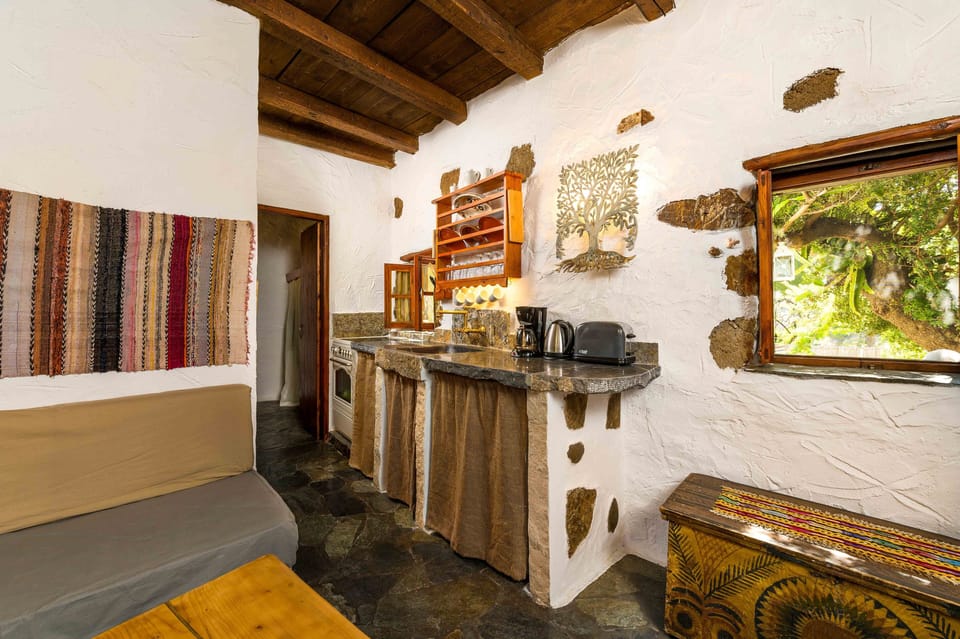 "Natura cottages at Makris Gialos" 
Full equiped kitchen garden & mountain view 