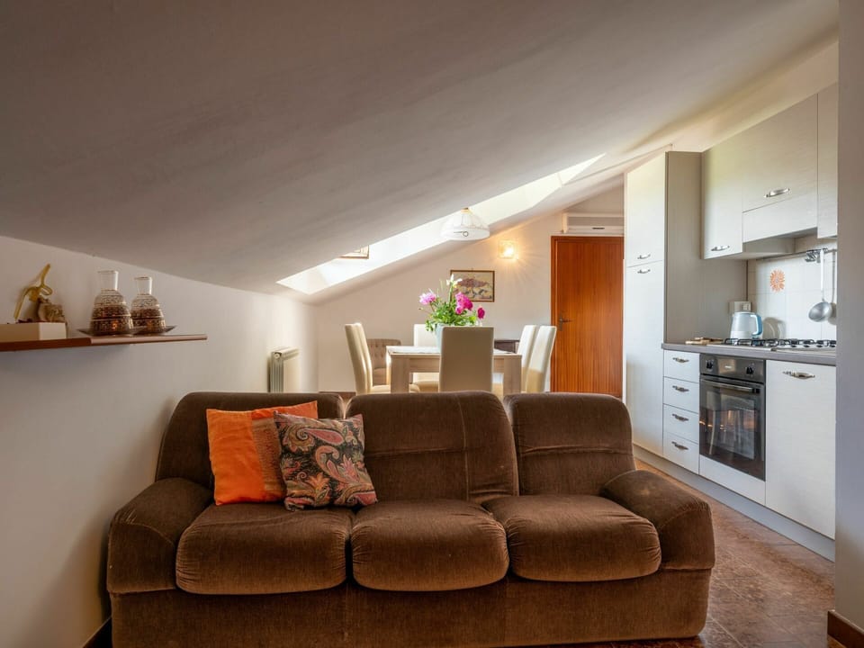 Property, Couch, Furniture, Building, Cabinetry, Picture Frame, Wood, Comfort, Lighting, Interior Design