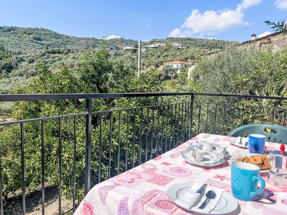 Tableware, Sky, Table, Plant, Cloud, Dishware, Building, Nature, Coffee Cup, Chair