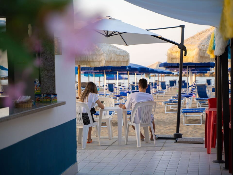 Architecture, Shade, Leisure, Chair, Sky, City, Event, Fun, Mixed-Use