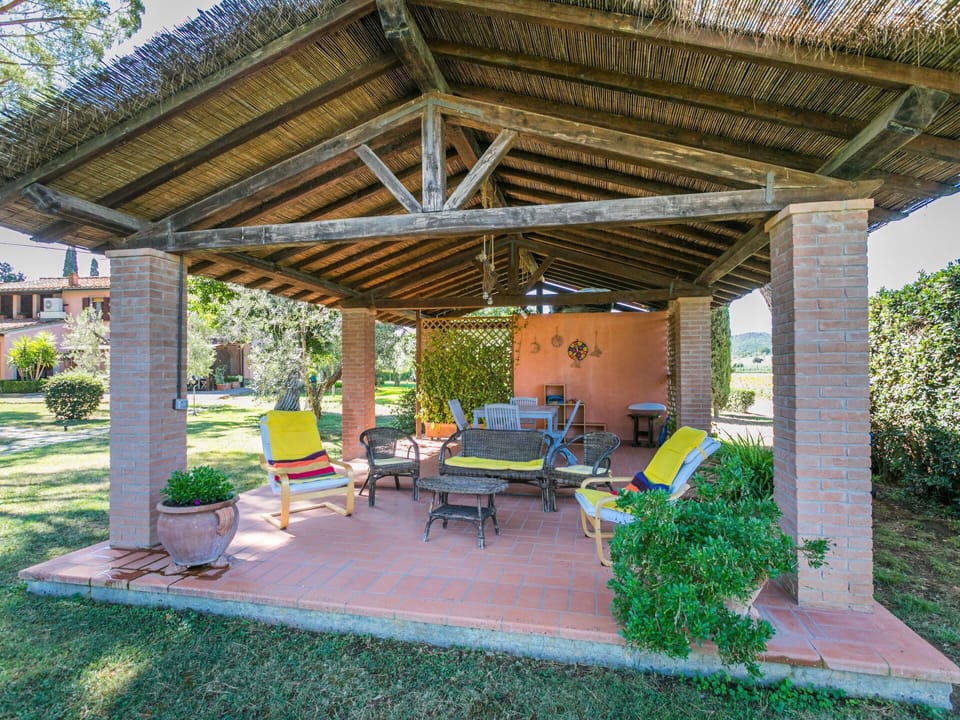 Plant, Furniture, Property, Table, Shade, Outdoor Furniture, Outdoor Table, Chair, Building, Architecture