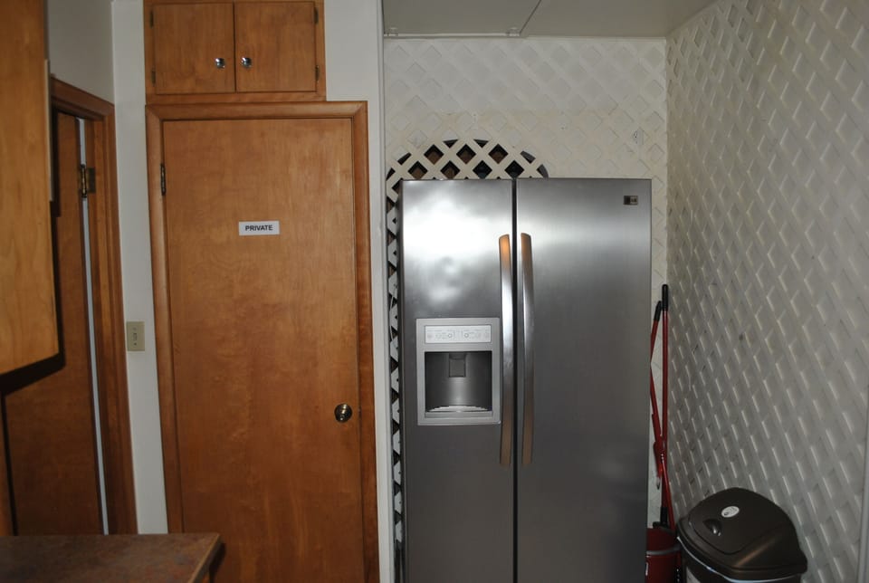 full size refrigerator with water & ice. 
