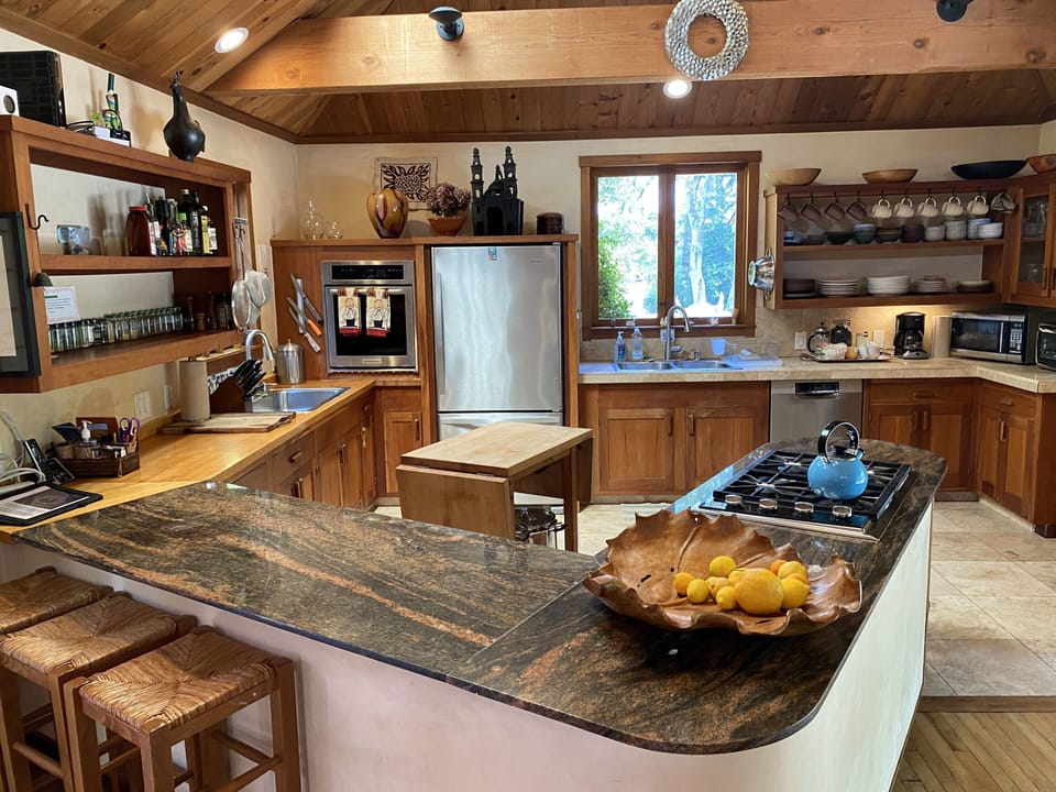 Large, open, well equipped kitchen with two sinks makes cooking together fun. 