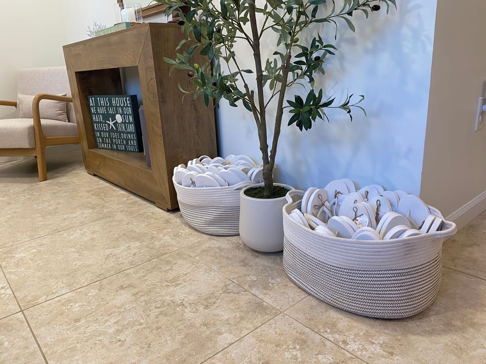 Forgot your flip-flops? Take a pair from the basket and they are yours to keep.