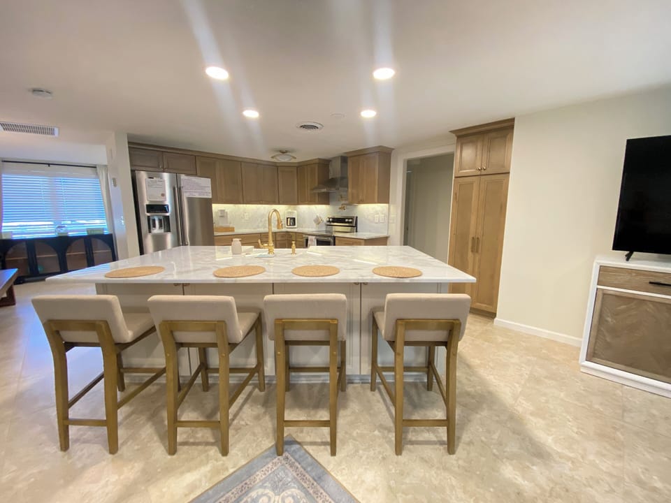 Beautifully updated open concept kitchen is the centerpiece of the house