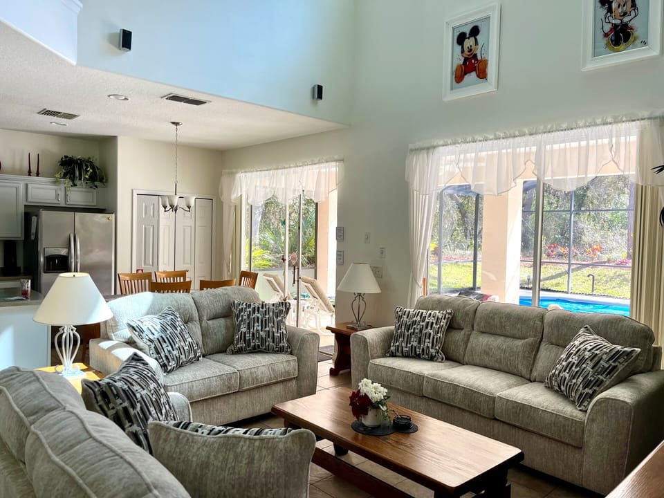Family Room with view to pool and conservation area.